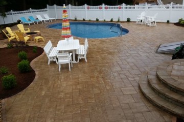 new pool installation with brick paver surround and patio